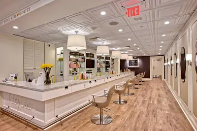 a salon with a row of chairs and a counter at Balboa Bay Resort in Newport Beach
