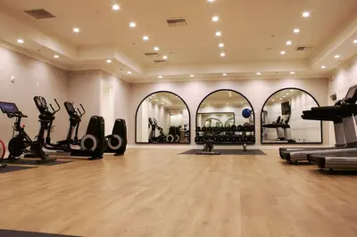 a gym with treadmills and exercise equipment in a room at Hilton San Diego/Del Mar in San Diego