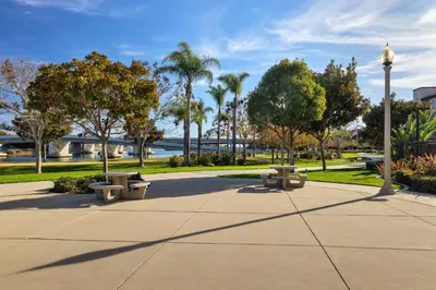 a park with benches and trees and a street light at Homewood Suites by Hilton San Diego Airport-Liberty Station in San Diego