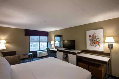 a hotel room with a bed and a desk at Hampton Inn by Hilton San Diego - Kearny Mesa in San Diego