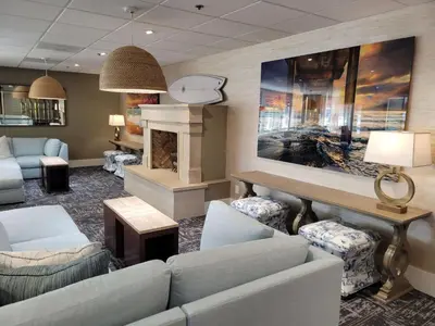 a living room with a couch and a fireplace at Hampton Inn by Hilton San Diego - Kearny Mesa in San Diego
