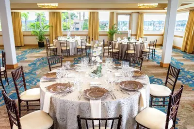 a large banquet room with tables and chairs at Hilton San Diego Airport/Harbor Island in San Diego