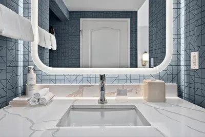 a bathroom with a sink and a mirror at Homewood Suites by Hilton Carlsbad-North San Diego County in Carlsbad