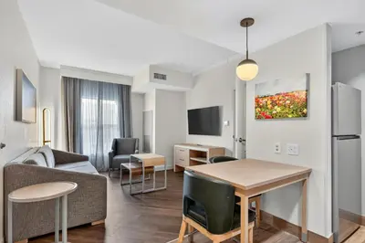 a living room with a couch and a table at Homewood Suites by Hilton Carlsbad-North San Diego County in Carlsbad