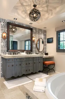 a bathroom with a tub and a large mirror at Rancho Valencia Resort and Spa in Rancho Santa Fe