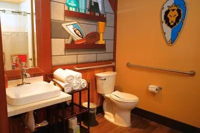 a bathroom with a toilet and a sink at LEGOLAND California Hotel and Castle Hotel in Carlsbad