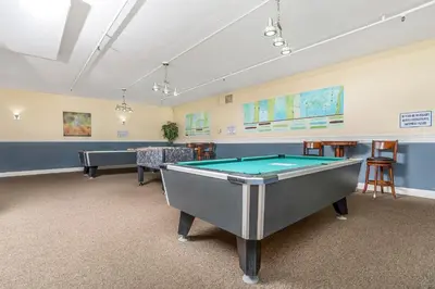 a room with a pool table in it at Condo in Beachfront Resort B-212 in Oceanside
