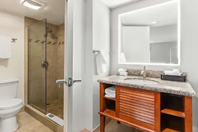 a bathroom with a sink and a shower at Best Western Chula Vista/Otay Valley Hotel in Chula Vista