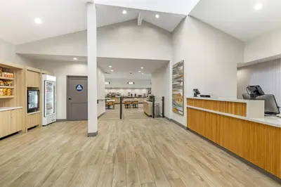 an empty lobby of a pharmacy with a counter and a pharmacyacistacistacistacist at Best Western Chula Vista/Otay Valley Hotel in Chula Vista