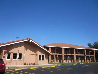 a parking lot in front of a hotel at Rancho California Inn Temecula in Temecula
