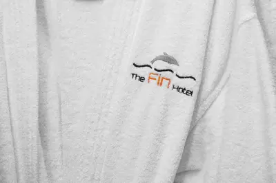 a white tshirt with a beard and the hfm tribe at The Fin Hotel, Tapestry Collection by Hilton in Oceanside