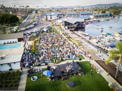 an overhead view of a crowd of people at a marina at Lakehouse Resort in San Marcos