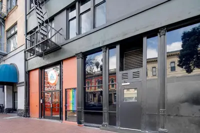 a facade of a building with windows on a street at HI San Diego Downtown Hostel in San Diego