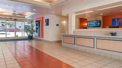 a lobby of a hospital with a reception counter at Motel 6-San Diego, CA - Downtown in San Diego