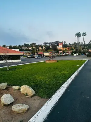 a street with rocks on the side of the road at Franciscan Inn Motel in Vista