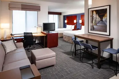 a hotel room with a couch and a bed at Residence Inn by Marriott San Juan Capistrano in San Juan Capistrano