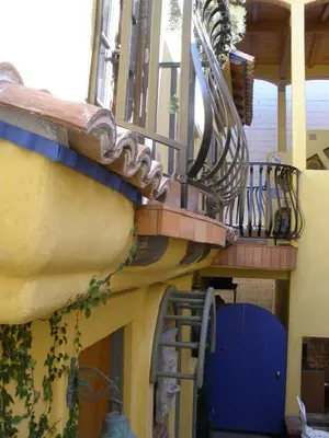 a staircase on the side of a building at Secret Garden Inn in San Diego