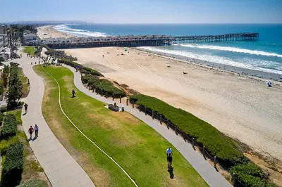a view of a beach and a pier at Pacific View Inn in San Diego