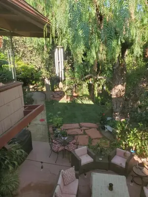 a backyard with a patio with a table and chairs at Casa Tranquility in San Diego