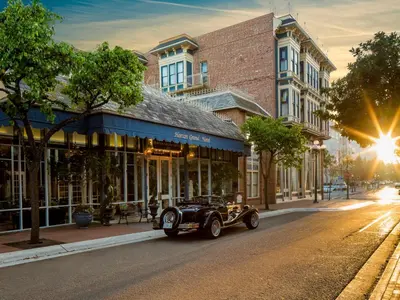 a vintage car parked on a city street at Horton Grand Hotel in San Diego