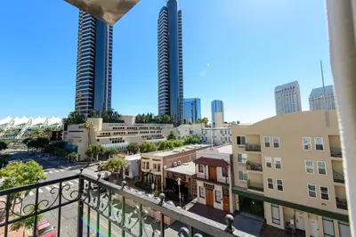 a view from a balcony of a city with tall buildings at Horton Grand Hotel in San Diego