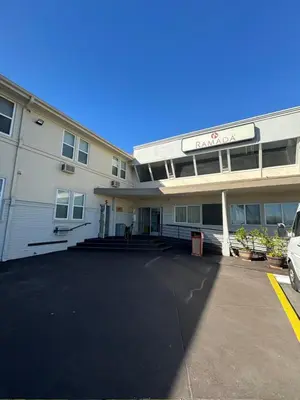 a parking lot in front of a building at Ramada by Wyndham San Diego Airport in San Diego