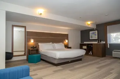 a hotel room with a bed and a window at Holiday Inn Express San Diego Airport-Old Town by IHG in San Diego