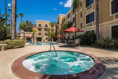 a small swimming pool in the middle of a courtyard at Best Western Escondido Hotel in Escondido