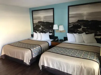 a hotel room with two beds in a room at Northgate Motel in El Cajon