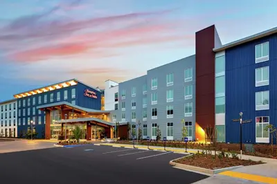 a rendering of a hotel with a parking lot at Hampton Inn & Suites San Diego Airport Liberty Station in San Diego