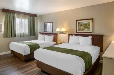 a hotel room with two beds and a window at Quality Inn & Suites El Cajon San Diego East in El Cajon