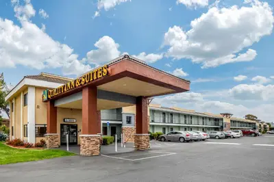 a building with a sign for a hotel at Quality Inn & Suites El Cajon San Diego East in El Cajon