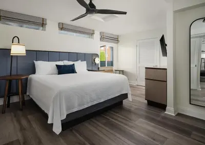 a bedroom with a bed and a ceiling fan at Hotel Indigo San Diego Del Mar by IHG in San Diego