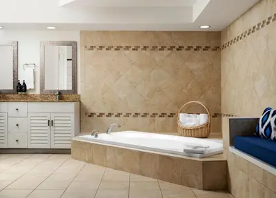 a bathroom with a tub and a sink and a mirror at Hotel Indigo San Diego Del Mar by IHG in San Diego