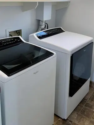 a kitchen with a white stove and a microwave at 125-Fun In The Sun Penthouse in San Diego