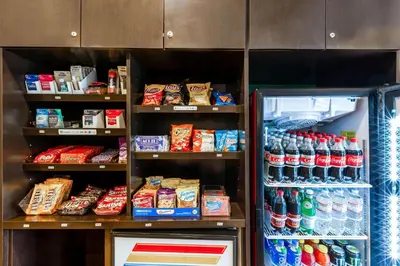 a refrigerator filled with lots of food and drinks at La Quinta by Wyndham San Diego Mission Bay in San Diego