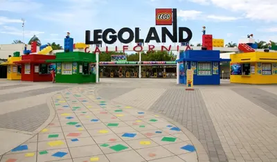 a playground in front of a legoland amusement park at 101-Luxury1 in San Diego