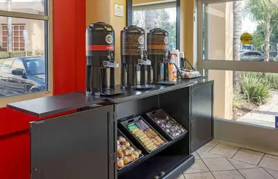 a counter with a coffee machine on top of it at Extended Stay America Suites - Orange County - Irvine Spectrum in Irvine