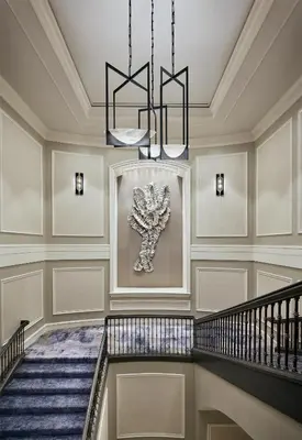 a staircase in a building with a chandelier at Park Hyatt Aviara in Carlsbad