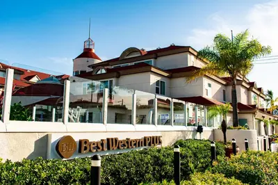 a building with a sign in front of it at Best Western Plus Suites Hotel Coronado Island in San Diego