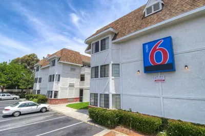 a building with a sign on the side of it at Motel 6-Chula Vista, CA - San Diego in Chula Vista