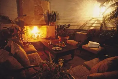 a living room with a couch and a table at The Tides Laguna Beach in Laguna Beach
