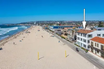 an aerial view of a beach with people on it at 108-Ocean Front Combo in San Diego
