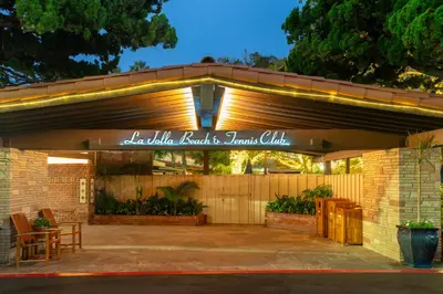 a garage with a sign that reads la belle beauty andourmet club at La Jolla Beach & Tennis Club in San Diego
