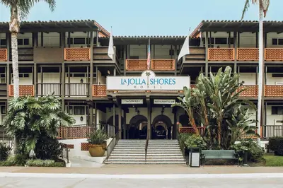 a building with a sign that reads la colonial stores at La Jolla Shores Hotel in San Diego