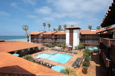 an aerial view of a resort with a swimming pool at La Jolla Shores Hotel in San Diego