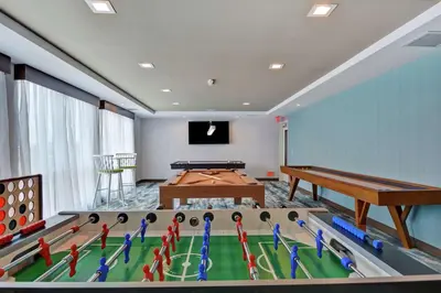 a billiard room with a table and a pool table at Homewood Suites By Hilton Chula Vista Eastlake in Chula Vista