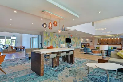 a lobby of a hotel with a living room at Hampton Inn Chula Vista Eastlake in Chula Vista