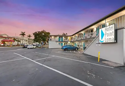 a parking lot in front of a hotel point inn at Hotel Point Loma in San Diego