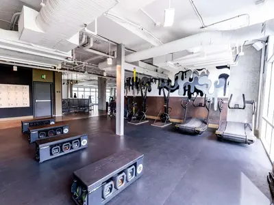 a gym with cardio equipment in a large room at Carte Hotel San Diego Downtown, Curio Collection By Hilton in San Diego